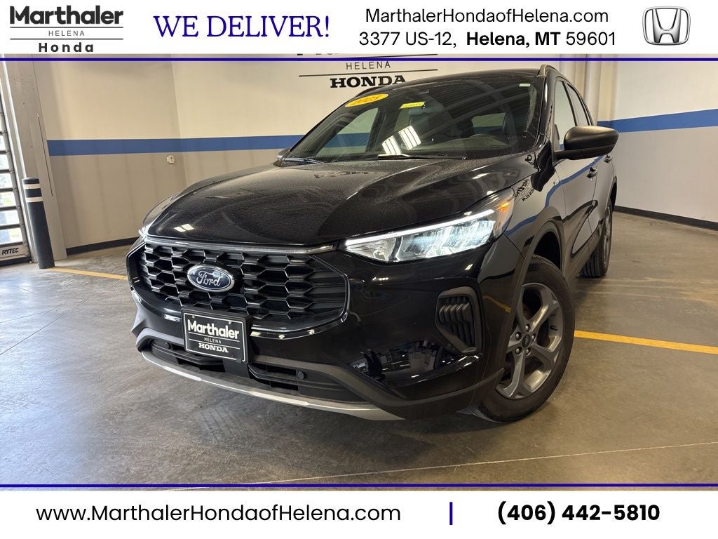 2025 Ford Escape ST-Line AWD in Agate Black Metallic — front three-quarter view