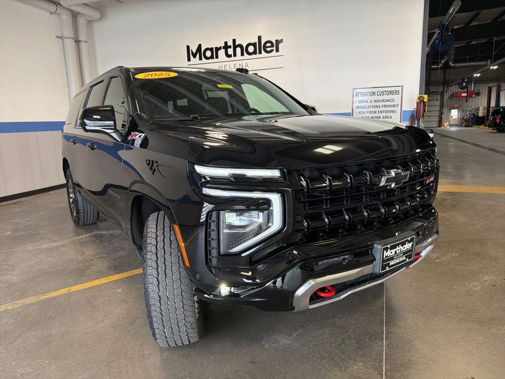2025 Chevrolet Suburban — rear three-quarter view