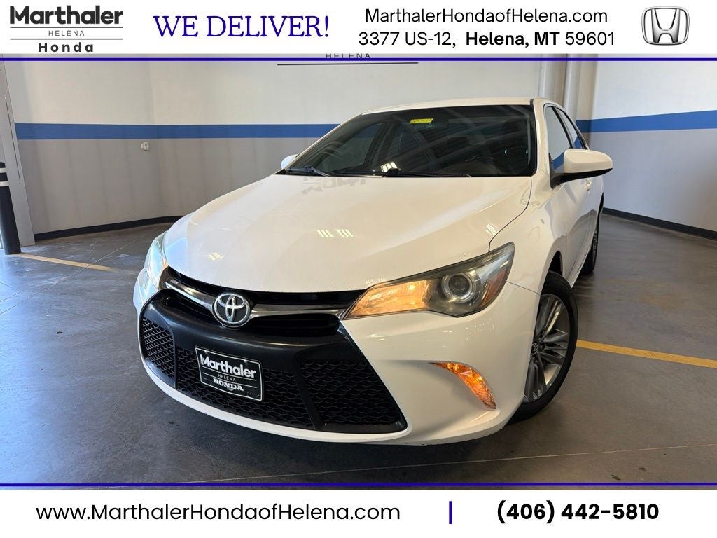 2016 Toyota Camry SE in Super White — front three-quarter view